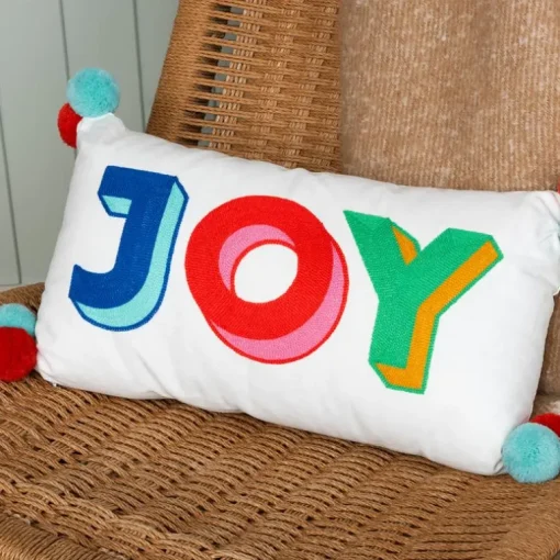 Embroidered cushion with pom poms - Joy