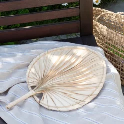 Palm leaf hand fan