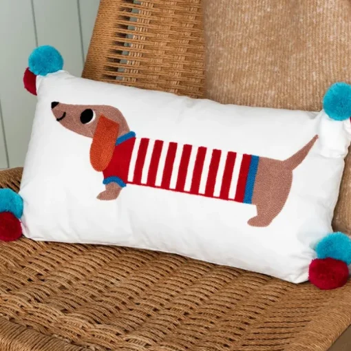 Embroidered cushion with pom poms - Sausage Dog